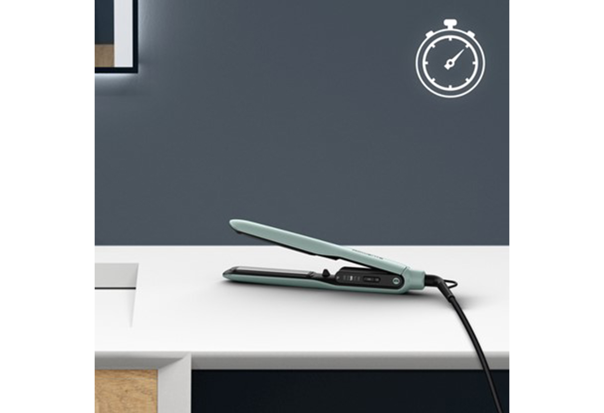 Απεικονίζεται το ισιωτικό πάνω σε πάγκο. Πάνω δεξιά, το εικονίδιο ενός χρονόμετρου.